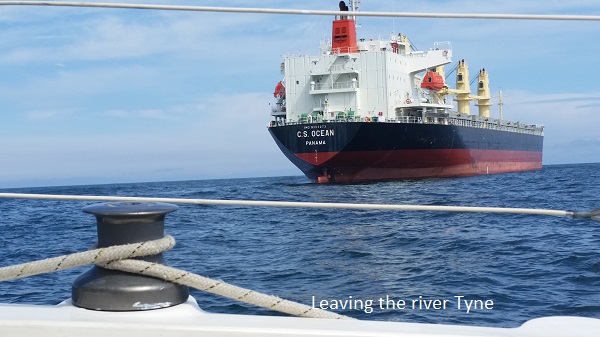 Ship leaving river Tyne